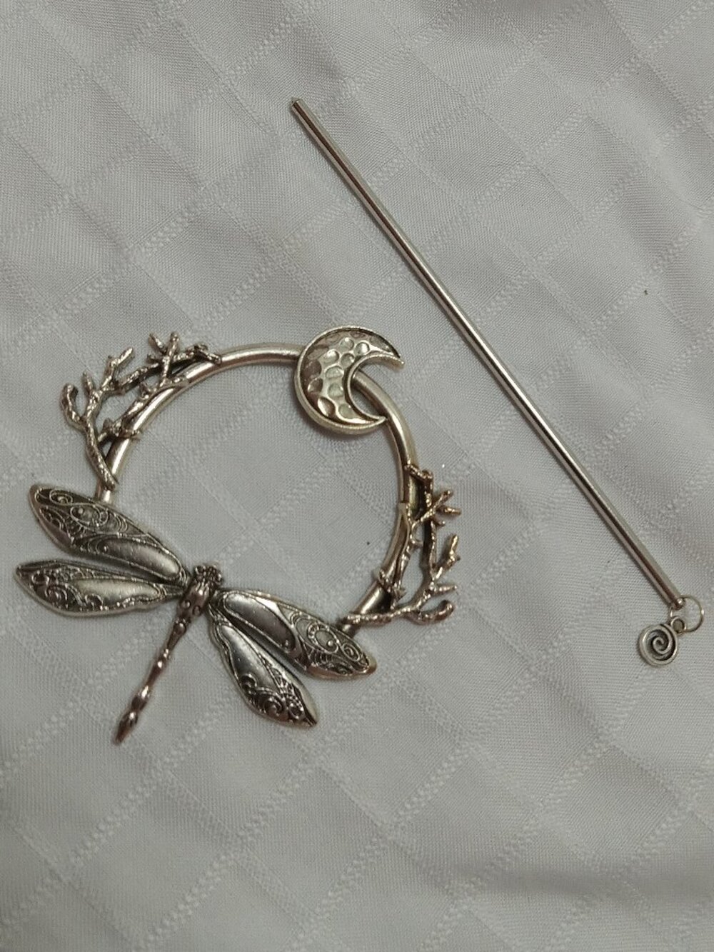 Metal hair pin in a vintage style, decorated with a moon and firefly design